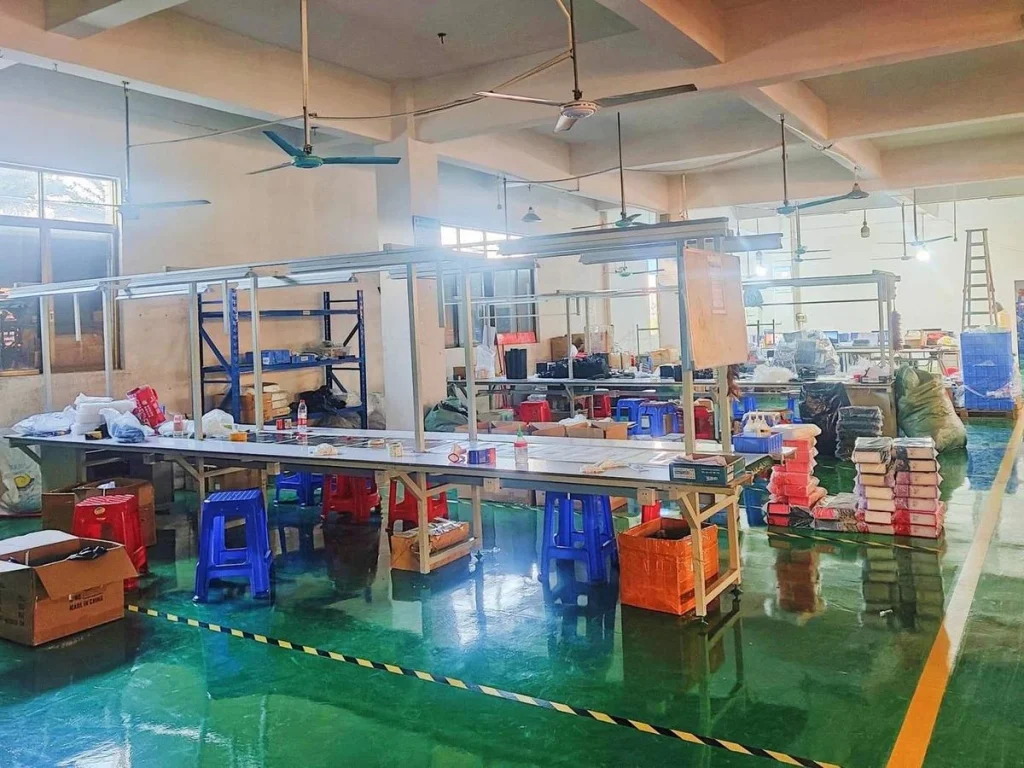 Assembly benches on the production floor of our manufacturing partner