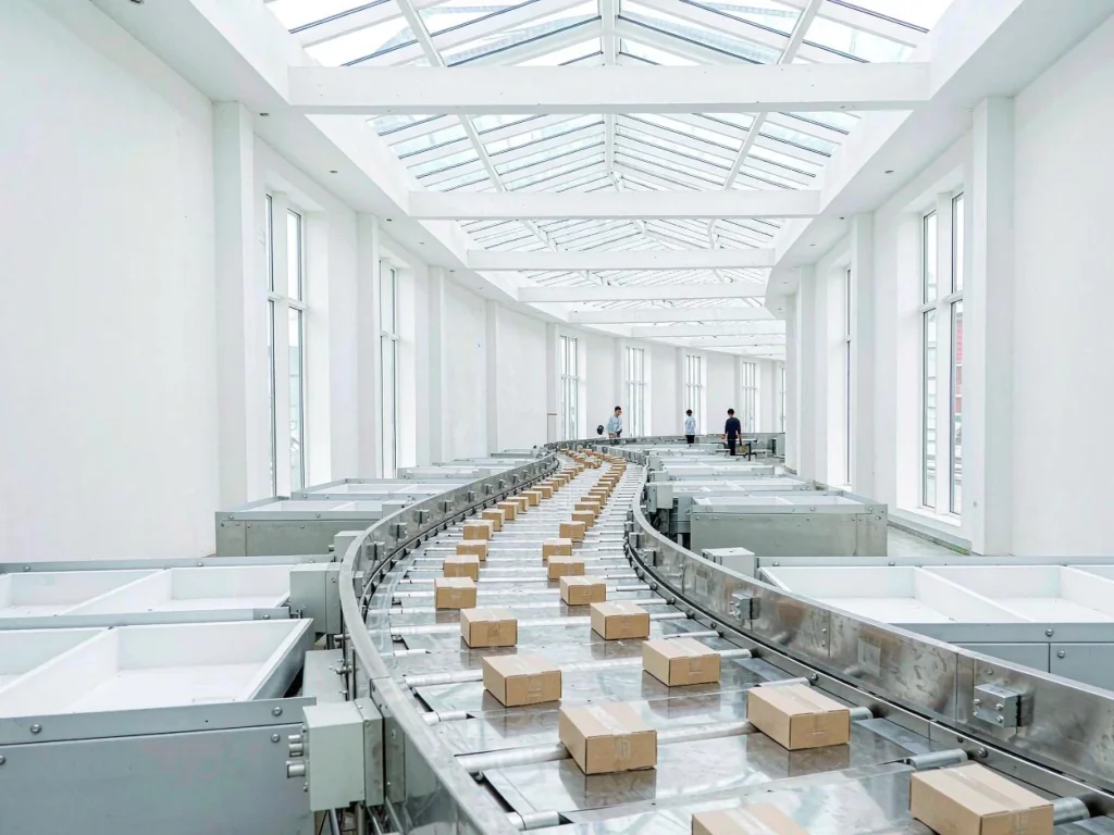 Parcels moving along a sorting conveyor